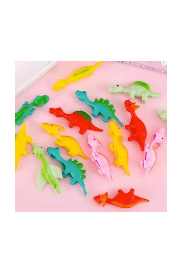 ASSIGN Mini Jouet Dinosaure Jouet Catapulte Slingshot, Jouet De Doigt Dinosaure Fronde Lance Pierres Extensible en Caoutchouc
